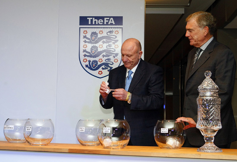 George Cohen conducts the draw for the Blind World Championship along with Sir Trevor Brooking.